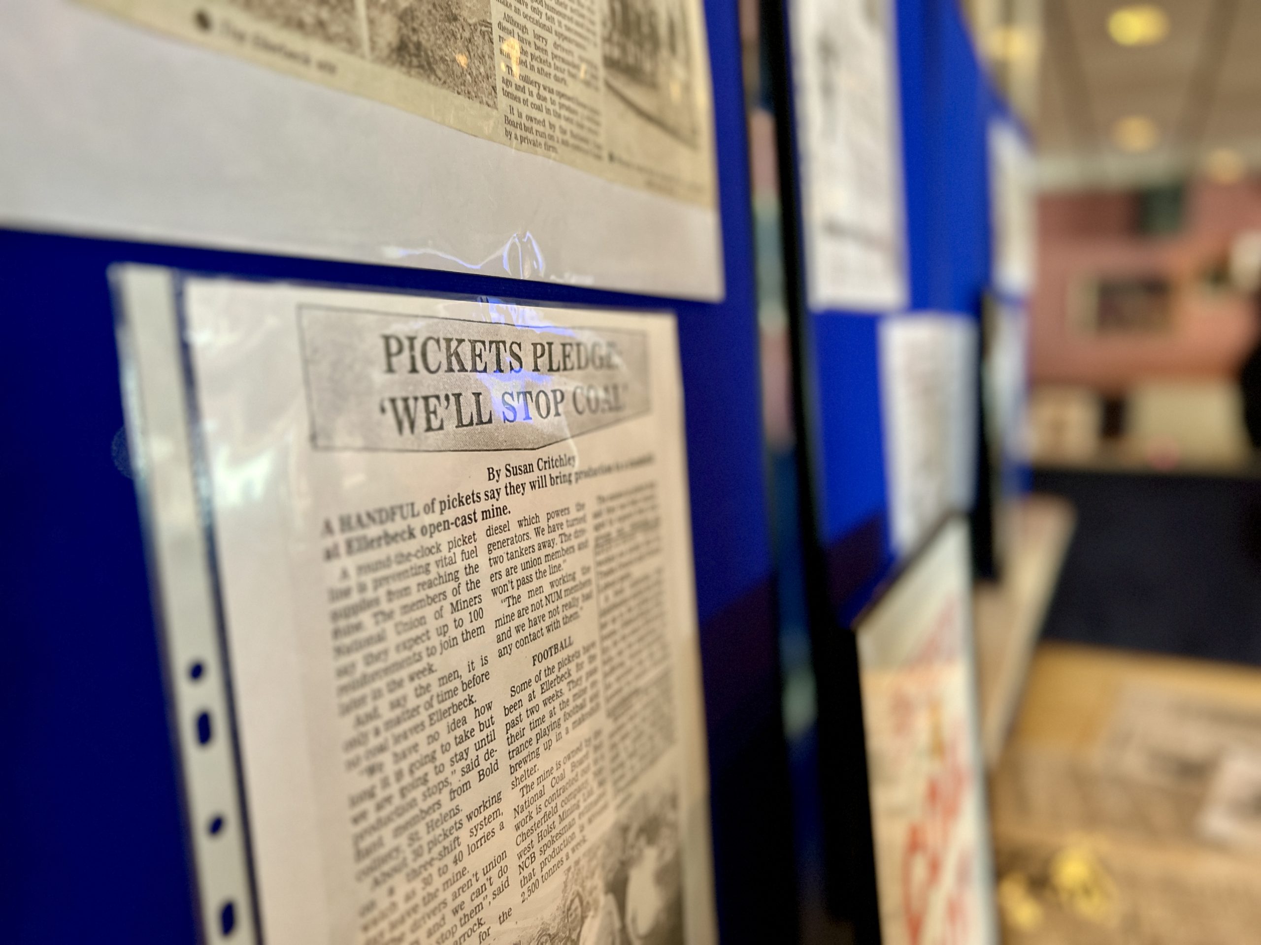 Newspapers, posters, photographic displays